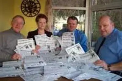 The Hawkinge Lib Dem team with a huge pile of petitions