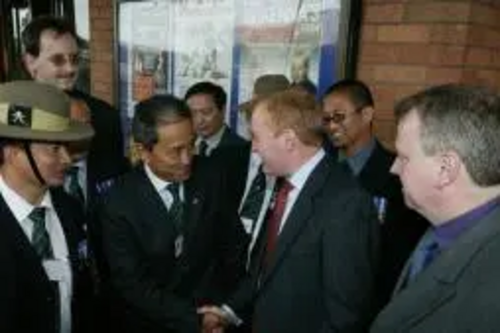 Gurkhas being greeted by Charles Kennedy  at Lib Dem Conference in Bournemouth