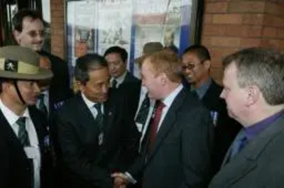 Gurkhas being greeted by Charles Kennedy  at Lib Dem Conference in Bournemouth