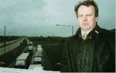 Peter Carroll standing on bridge in front of Operation Stack