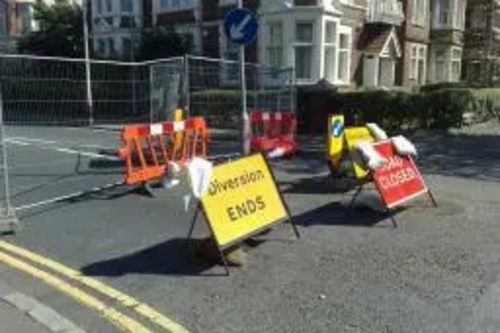 Road closed signs and barriers