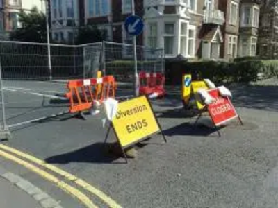 Road closed signs and barriers