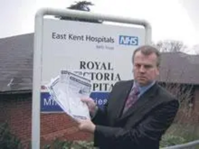 Peter Carroll outside the Royal Vic with some of the petitions he collected