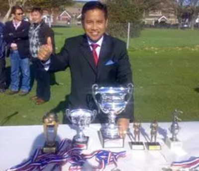 Dhan Gurung with football tournament trophies