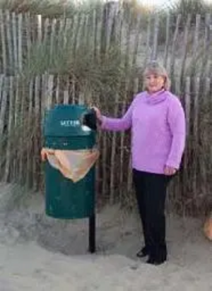 ann birchmore with a litter bin