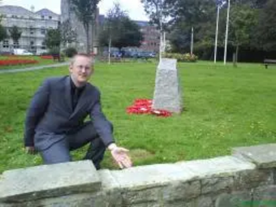 Gary Fuller with broken wall