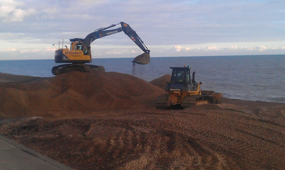 Sandgate Beach replenishment works (heavy plant moving shingle)