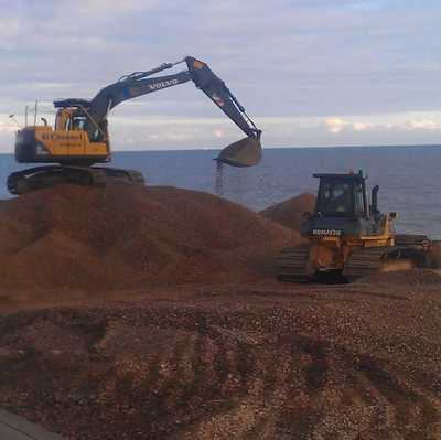 Sandgate Beach replenishment works (heavy plant moving shingle)