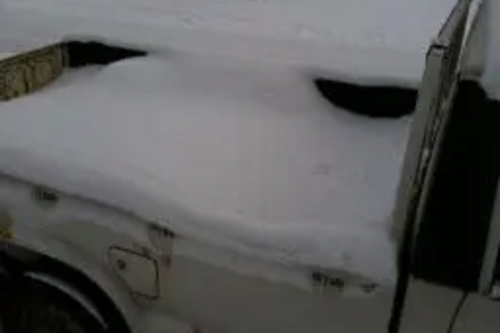 Truck filled with snow