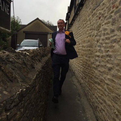 Tim Farron campaigning / running