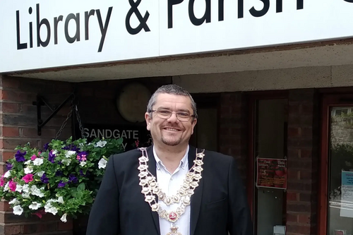 Tim Prater in front of Sandgate Library and Parish Council Office