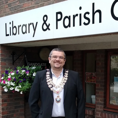 Tim Prater in front of Sandgate Library and Parish Council Office