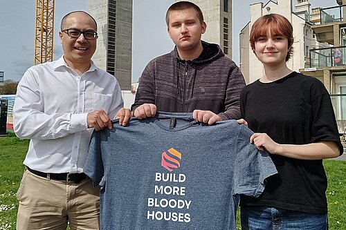 Larry Ngan, Daniel and Fry with "Build More Houses" t-shirt on The Leas, Folkestone