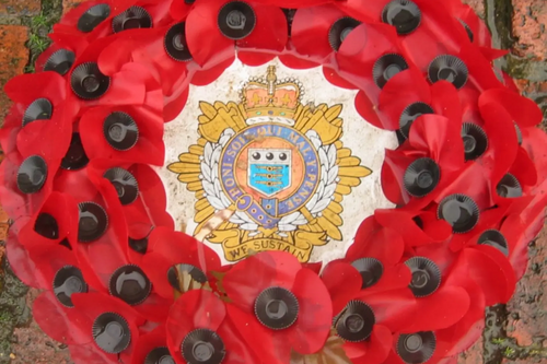 Poppy wreath at war memorial