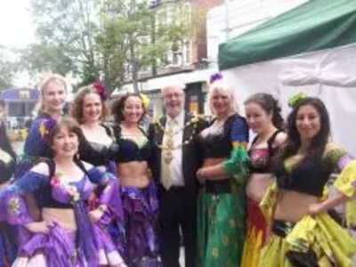 Tom McNeice with belly dancers