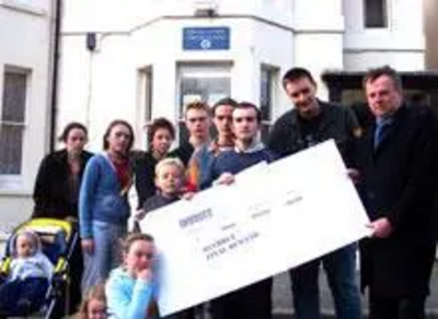 Shepway LDYS with giant invoice outside Folkestone Conservatives' HQ