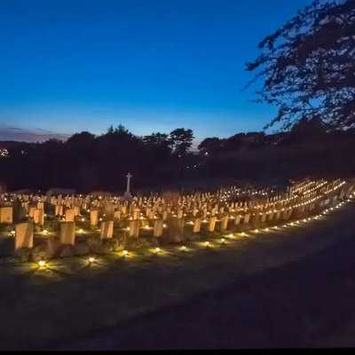 Shorncliffe Military Cemetery lit by lanterns