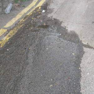 Water leaking from road (The Undercliffe)